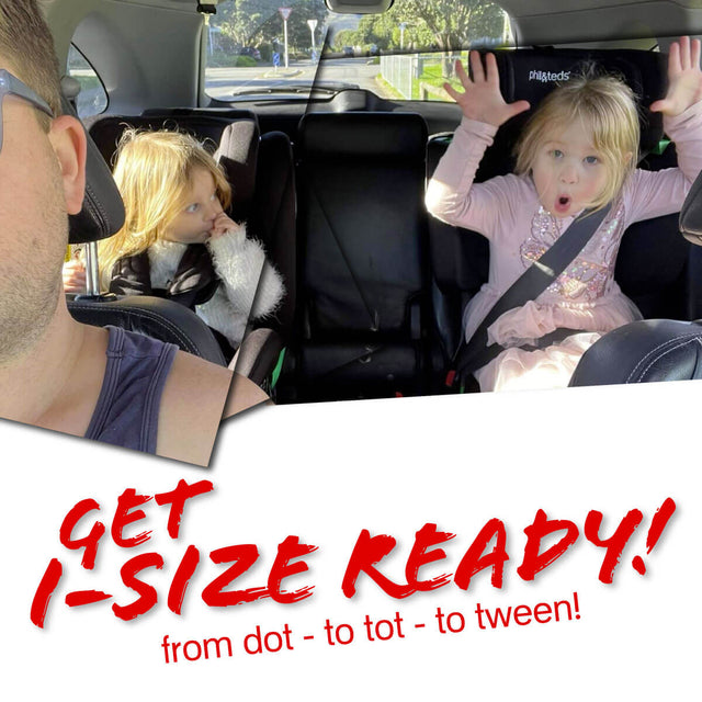 two kids sitting in the back seat of car safely belted into their car seats - phil and teds