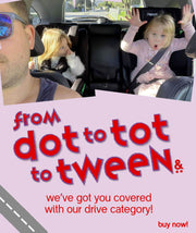Dad drives car while the children sit in their safety carseats - phil&teds