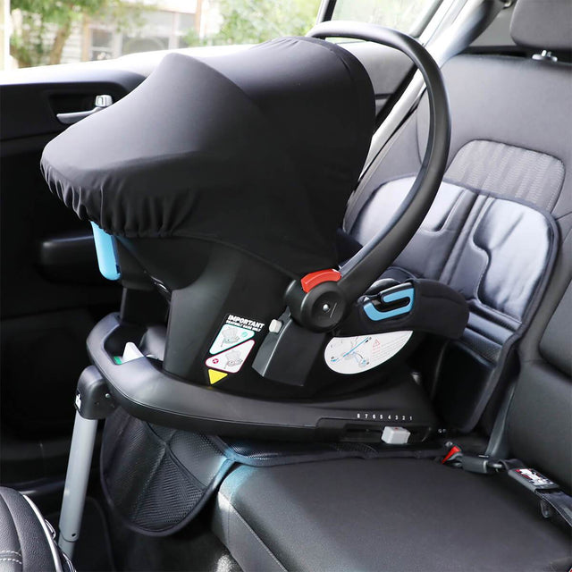 phil&teds® vehicle seat mate™ shown in car under alpha™ car seat and base, protecting the car interior fabrics from spills and indentations_black