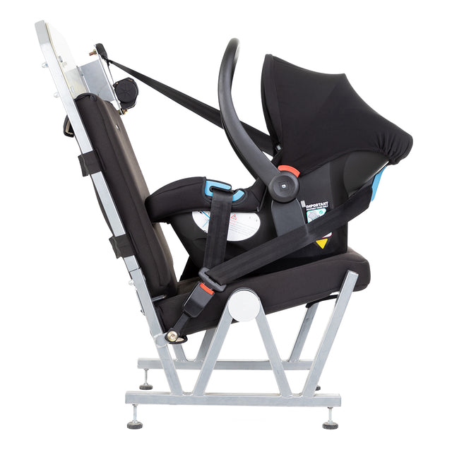 alpha™ infant car seat shown on a car seat demonstrating safe attachment in your vehicle using only your car's seat belt_black/grey marl