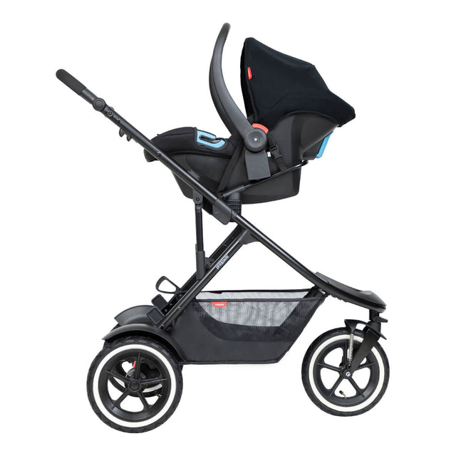 alpha™ infant car seat shown as a travel system using optional travel adaptors on a phil&teds® sport™ buggy