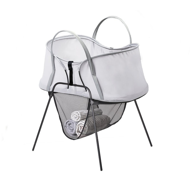 phil&teds carrycot stand with storage basket and nest baby bassinet on top 3/4 view_black