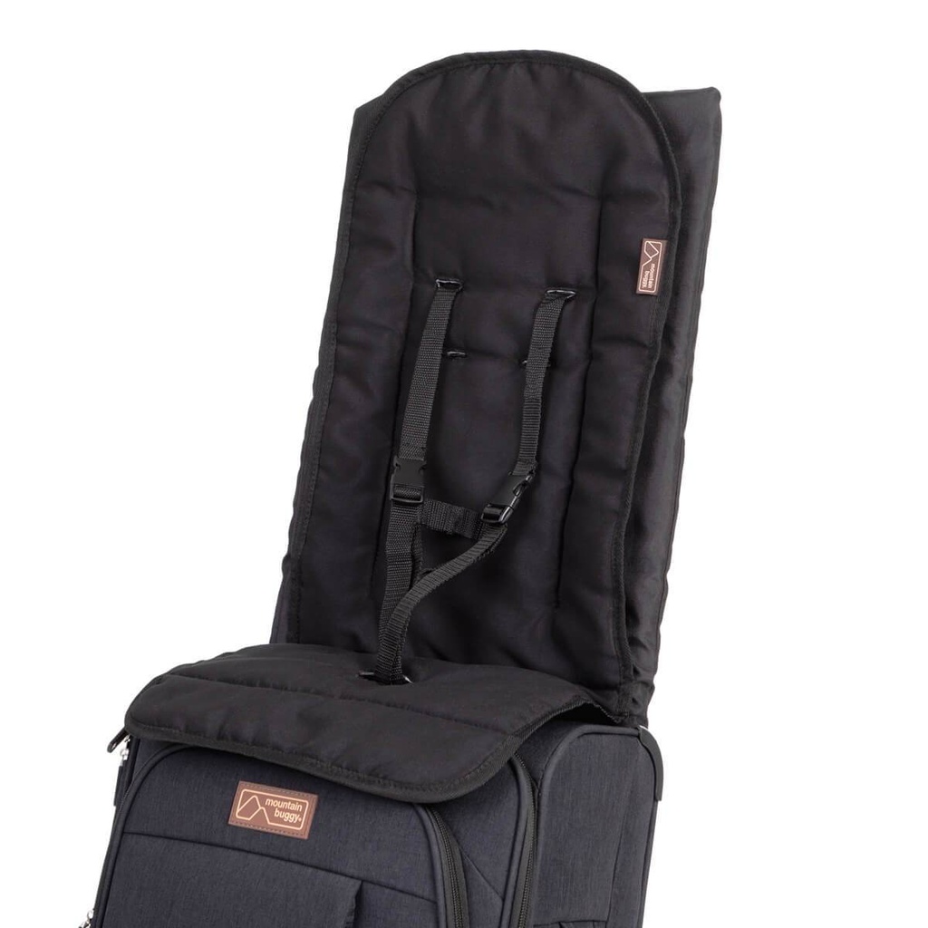 close up of the child seat and harness on the skyrider ride on suitcase to demonstrate the safety and comfort features