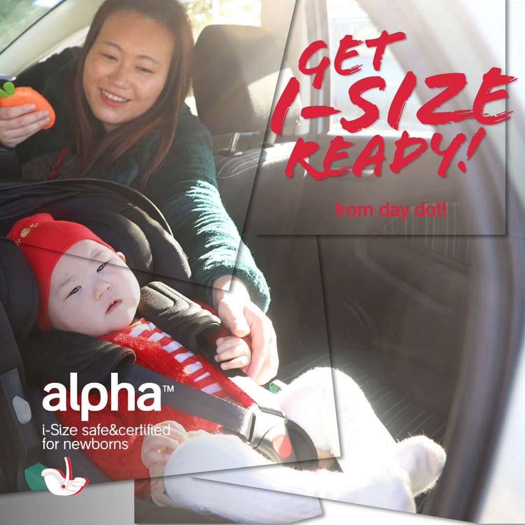 mum entertaining baby sitting in a rear facing phil&teds alpha i-size infant car seat three quarter